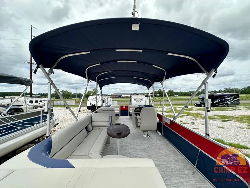 Slide: The Image of 2025 South Bay 224CR LE pontoon boat with canopy and seating. - 9