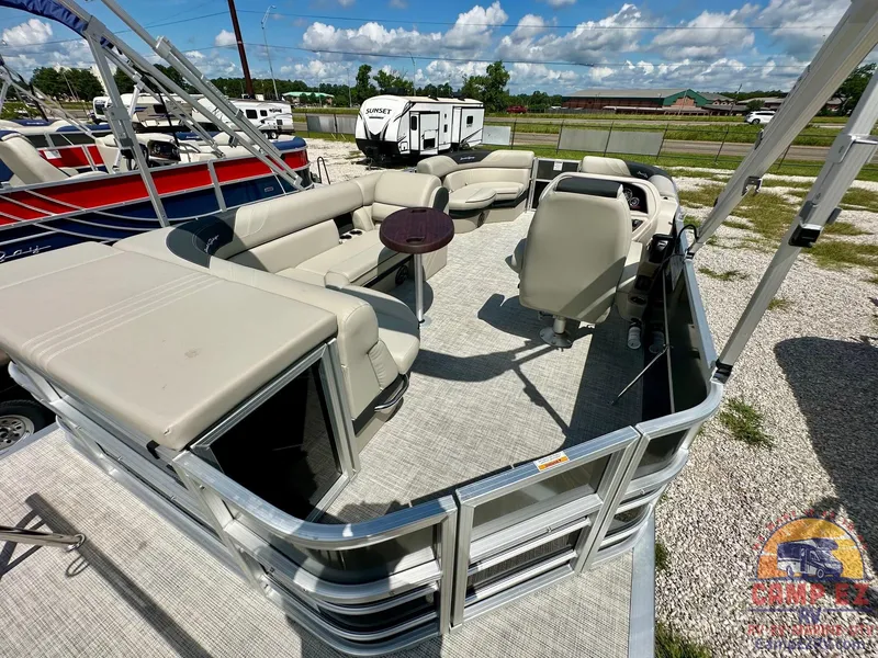Slide: The Image of 2025 South Bay 220CR LE pontoon boat with spacious seating and modern amenities. - 12