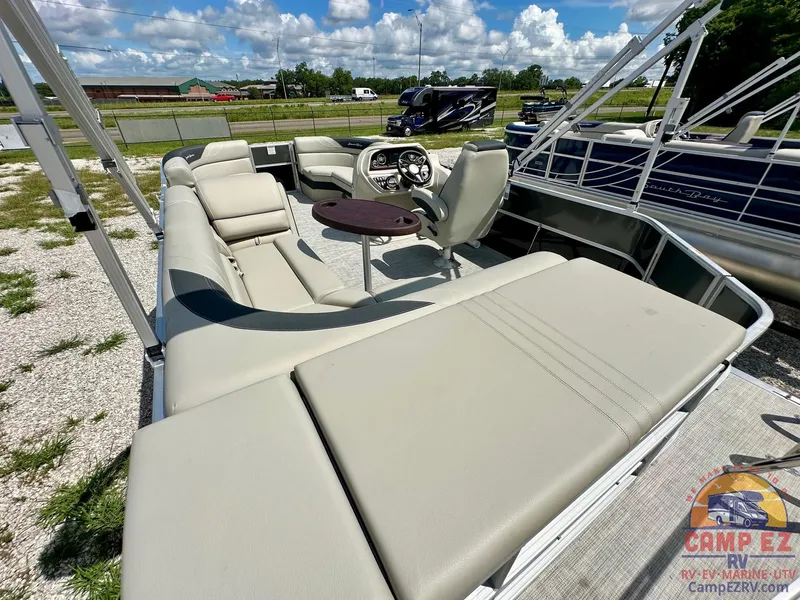 Slide: The Image of 2025 South Bay 220CR LE pontoon boat with spacious seating and modern design. - 14