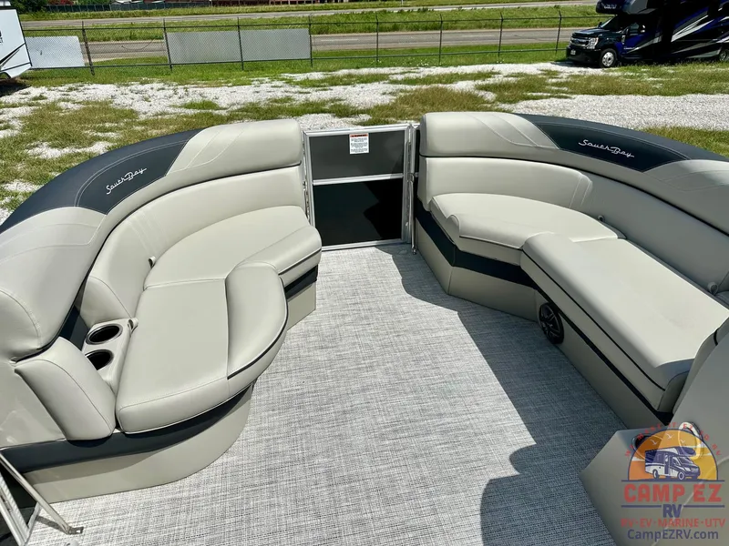 Slide: The Image of 2025 South Bay 220CR LE pontoon boat with spacious seating and modern design. - 23