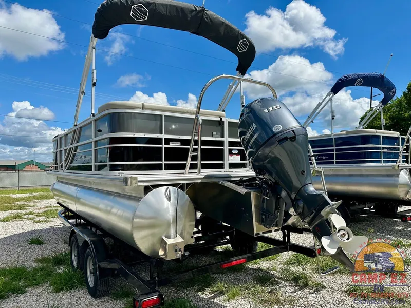 Slide: The Image of 2025 South Bay 220CR LE pontoon boat on trailer with Yamaha outboard motor. - 6