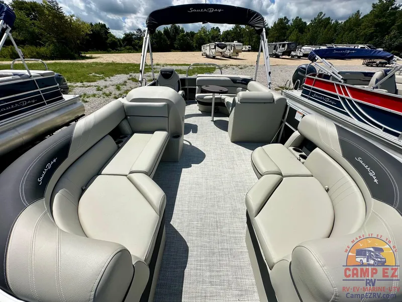Slide: The Image of 2025 South Bay 220CR LE pontoon boat with spacious seating and canopy. - 9