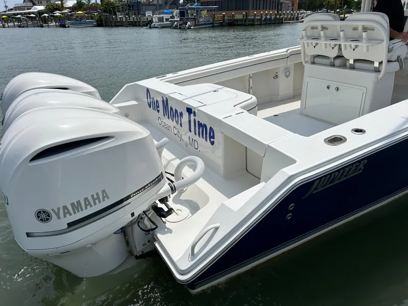 Slide: The Image of 2016 Jupiter 34 HFS boat with triple Yamaha F300 engines docked. - 25