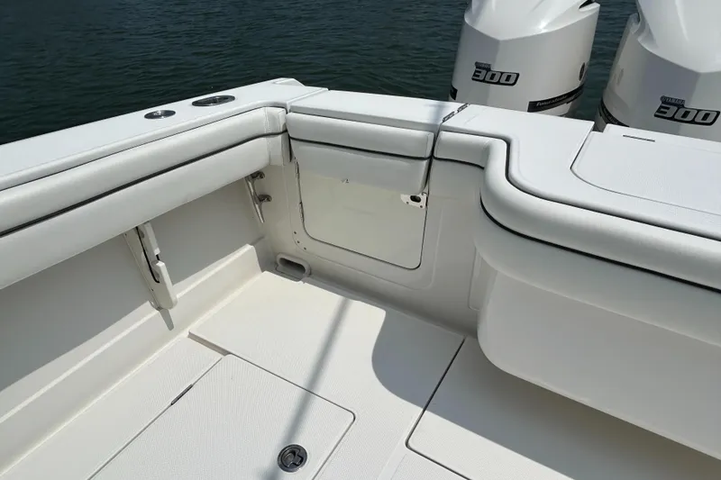 Slide: The Image of 2016 Jupiter 34 HFS boat with Triple Yamaha F300 engines, white deck and seating. - 30