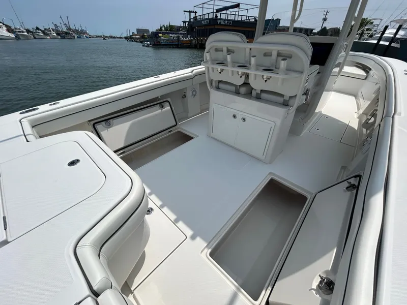 Slide: The Image of 2016 Jupiter 34 HFS boat interior with storage compartments and seating. - 37