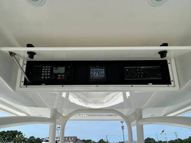 Slide: The Image of 2016 Jupiter 34 HFS boat console with navigation and communication equipment. - 45