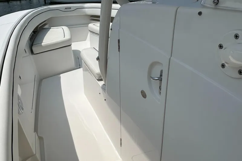 Slide: The Image of 2016 Jupiter 34 HFS boat interior with seating and storage compartments. - 48