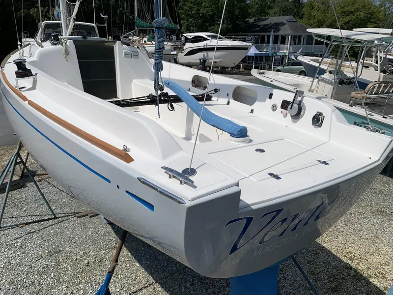 Slide: The Image of Sailboat Sparkman & Stephens 30, 2017 model, docked on land, showcasing sleek design and spacious deck. - 3