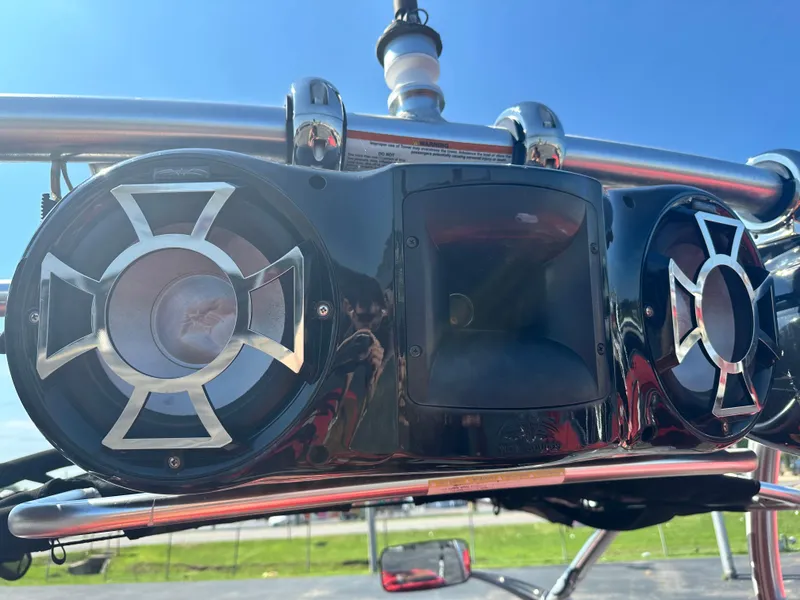 Slide: The Image of Close-up of 2009 Supra 21V LAUNCH boat speakers on a sunny day. - 13