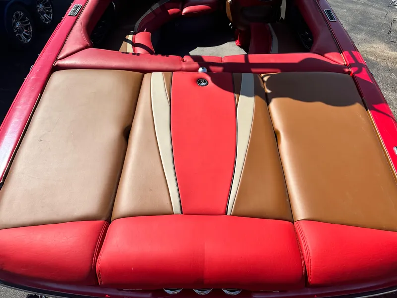 Slide: The Image of 2009 Supra 21V LAUNCH boat with red and tan leather interior. - 5
