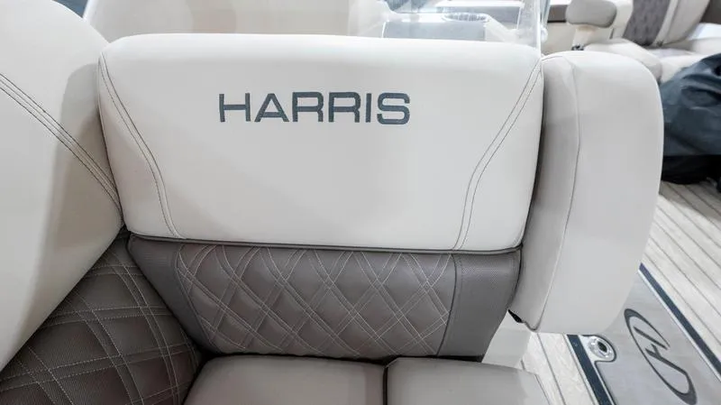 Slide: The Image of Harris SUNLINER 230 SLDH 2021 boat interior with white and gray seating. - 28