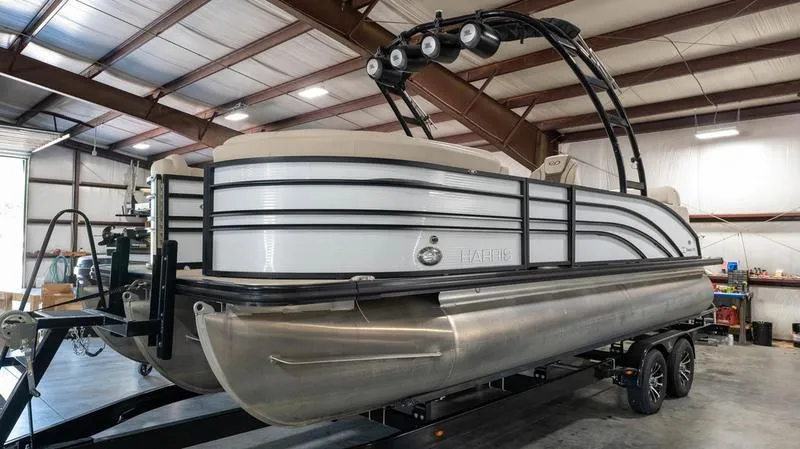 Slide: The Image of 2021 Harris SUNLINER 230 SLDH pontoon boat in a storage facility. - 37