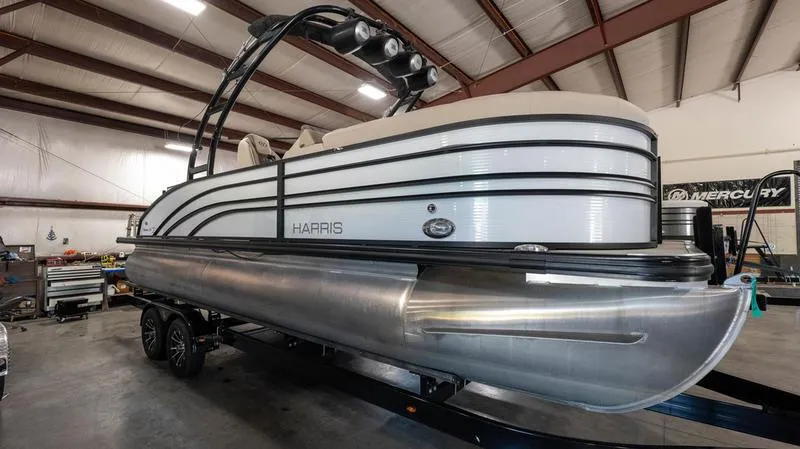 Slide: The Image of 2021 Harris SUNLINER 230 SLDH pontoon boat in a warehouse. - 4