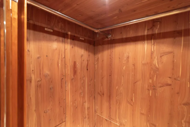 Slide: The Image of Cedar-lined closet in 2003 Hatteras 70 Convertible yacht. - 33