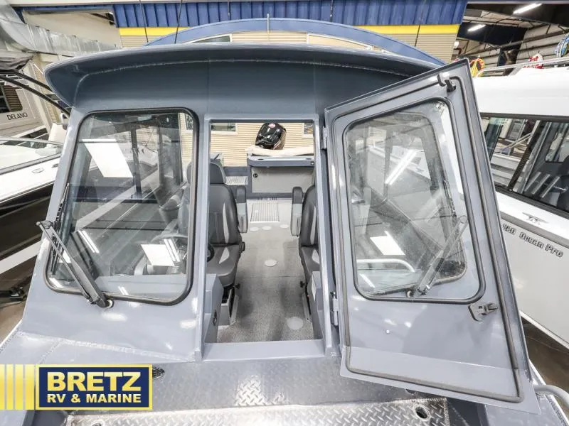 Slide: The Image of 2024 Sea Runner 190 ET HT boat interior at Bretz RV & Marine showroom. - 15