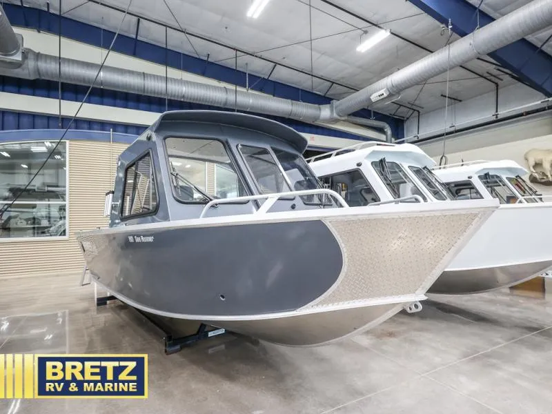 Slide: The Image of 2024 Sea Runner 190 ET HT boat displayed at Bretz RV & Marine showroom. - 2
