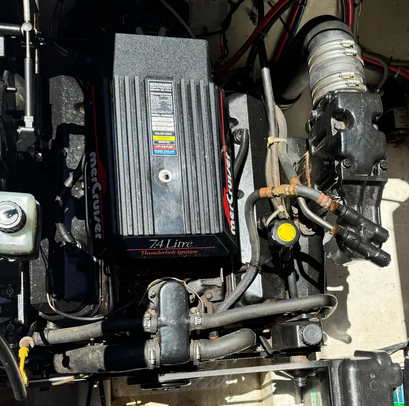 Slide: The Image of Engine compartment of a 1997 Maxum 3200 SCR with a 7.4L MerCruiser engine. - 18