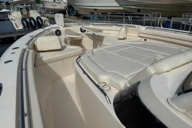 Slide: The Image of 2024 Grady-White Canyon 456 boat interior with spacious seating and modern design. - 13