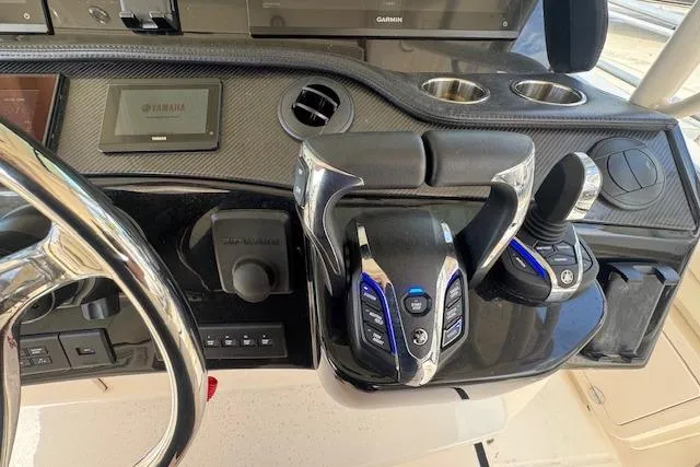 Slide: The Image of 2024 Grady-White Canyon 456 helm with advanced controls and navigation systems. - 20