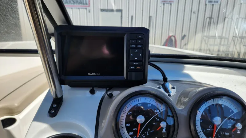 Slide: The Image of Garmin GPS and speedometer on 2015 Bayliner 175 Bowrider dashboard. - 3