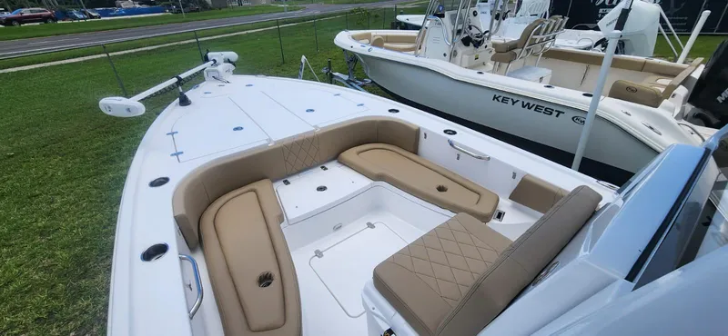 Slide: The Image of 2025 Blazer Bay 2440 boat with tan seating on display. - 5