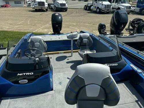 Slide: The Image of 2024 Nitro ZV19 Sport boat interior with seating and steering wheel. - 8