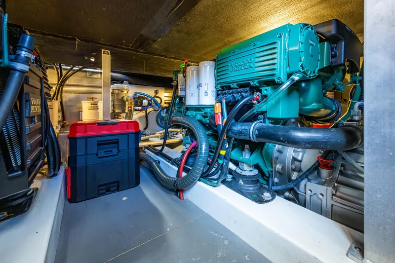 Slide: The Image of Engine compartment of a 2018 Beneteau Swift Trawler 44 with visible components. - 20