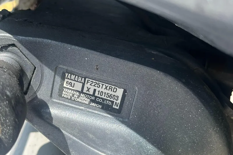 Slide: The Image of Close-up of Yamaha F225TXRD engine label on a 1981 Mako 236 boat. - 21