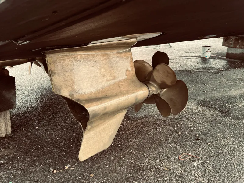 Slide: The Image of Close-up of the propeller and rudder of a 2009 Azimut Atlantis 50 yacht. - 11