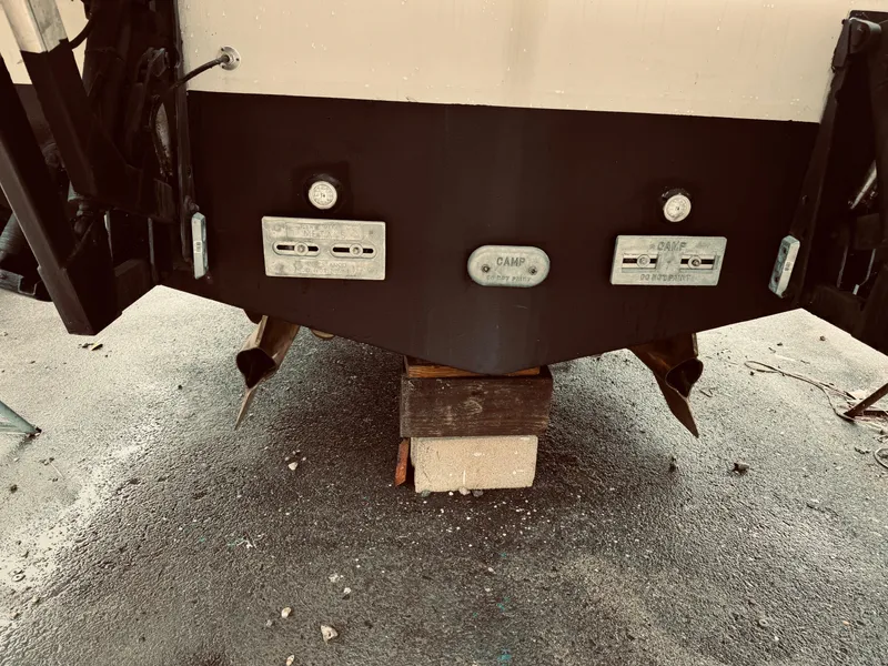 Slide: The Image of Rear view of a 2009 Azimut Atlantis 50 yacht on a block. - 13