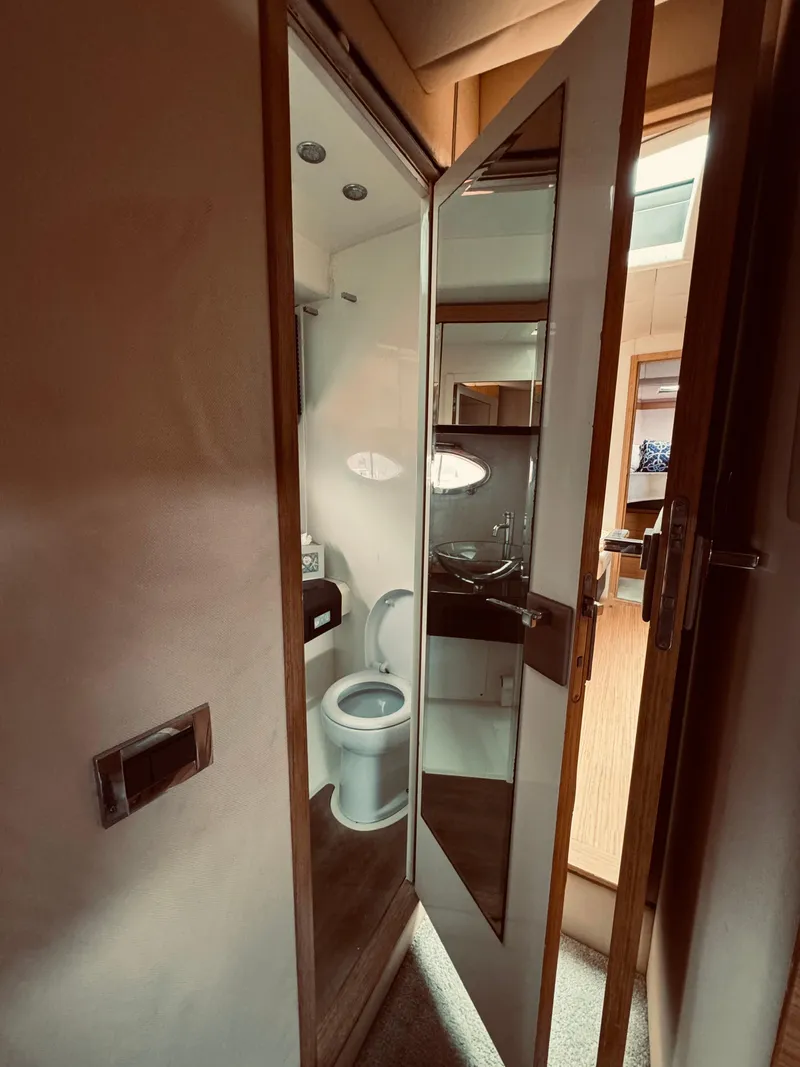 Slide: The Image of Bathroom interior of a 2009 Azimut Atlantis 50 yacht with modern fixtures. - 23