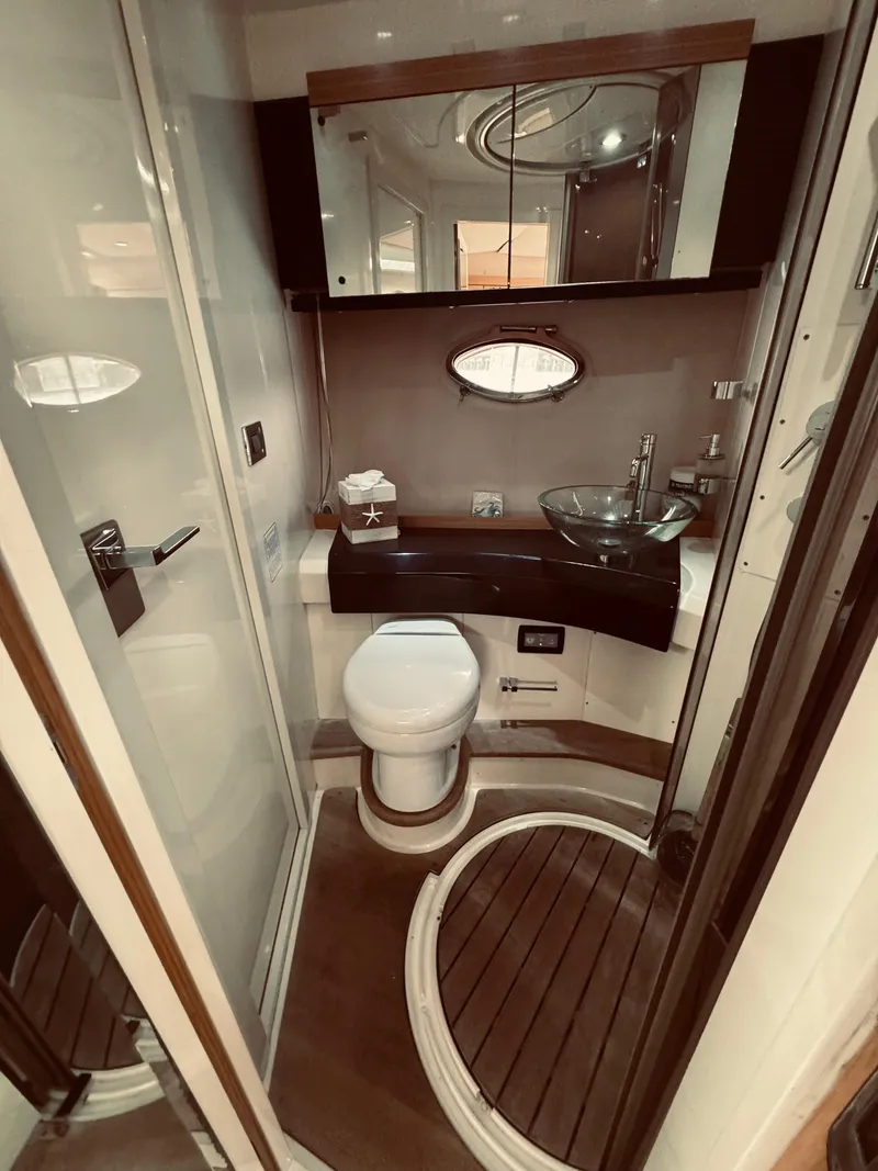 Slide: The Image of Luxurious bathroom on a 2009 Azimut Atlantis 50 yacht with modern fixtures. - 29