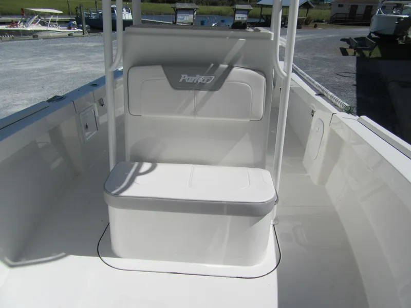 Slide: The Image of Parker 21 Special Edition 2025 boat interior with seating and storage. - 10