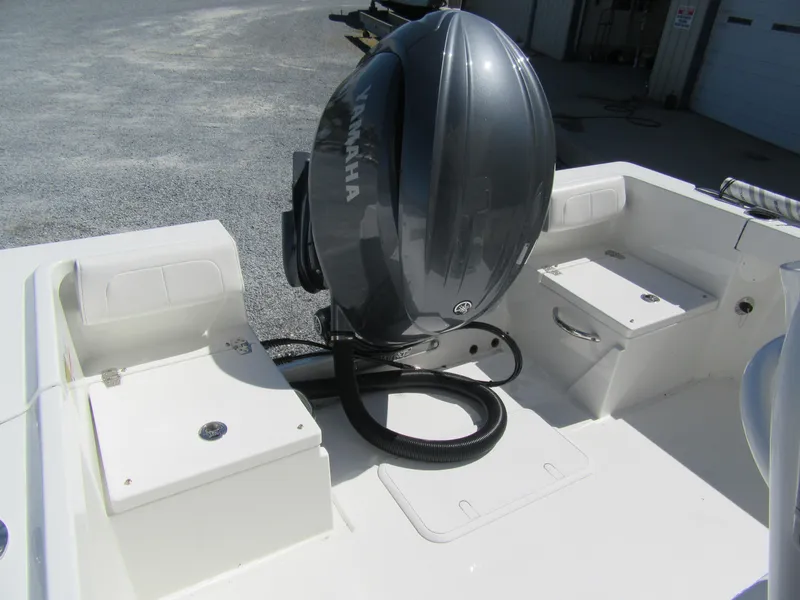 Slide: The Image of Parker 21 Special Edition boat, 2025 model, featuring a Yamaha outboard motor. - 4