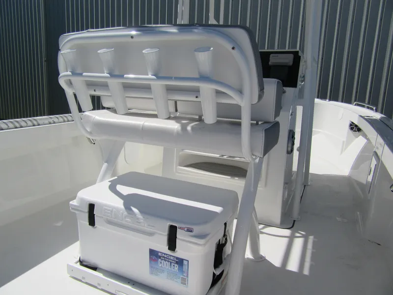 Slide: The Image of 2025 Parker 21 Special Edition boat interior with seating and cooler. - 5