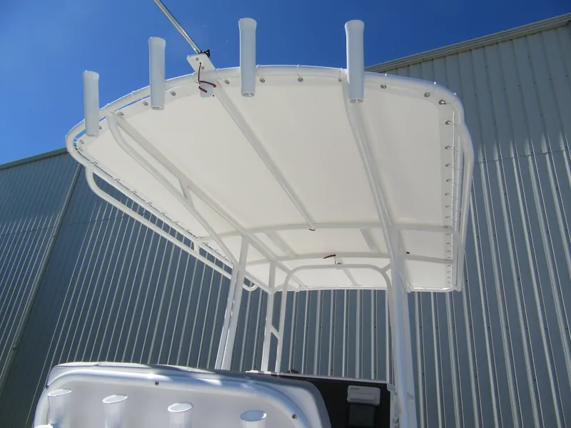 Slide: The Image of T-top canopy of Parker 21 Special Edition boat, 2025 model, against a clear blue sky. - 6