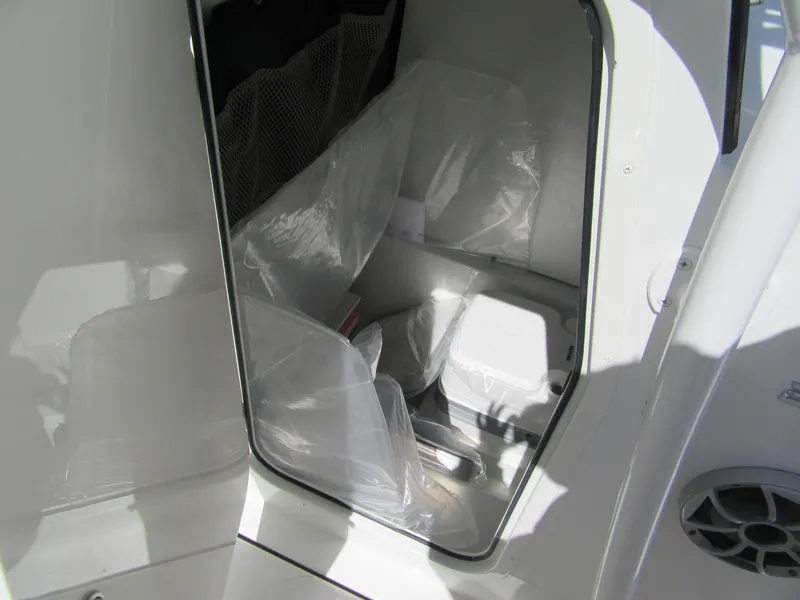 Slide: The Image of Interior of Parker 21 Special Edition 2025 boat, featuring a compact cabin space. - 8
