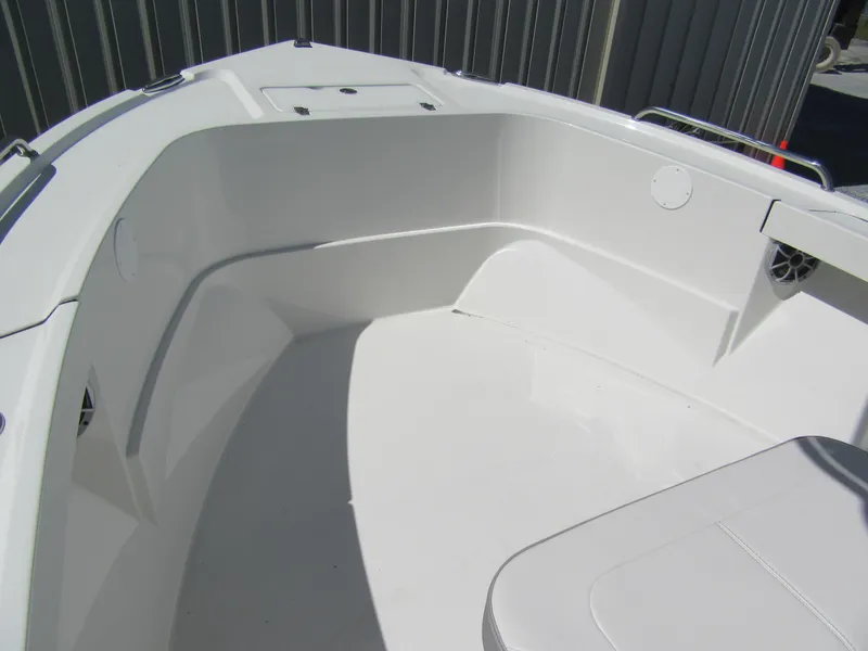 Slide: The Image of Parker 21 Special Edition 2025 boat interior, featuring sleek white seating and modern design. - 9
