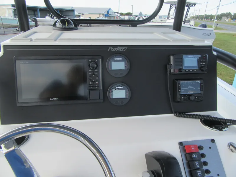 Slide: The Image of Control panel of 2025 Parker 23 SE CC boat with Garmin navigation system. - 18