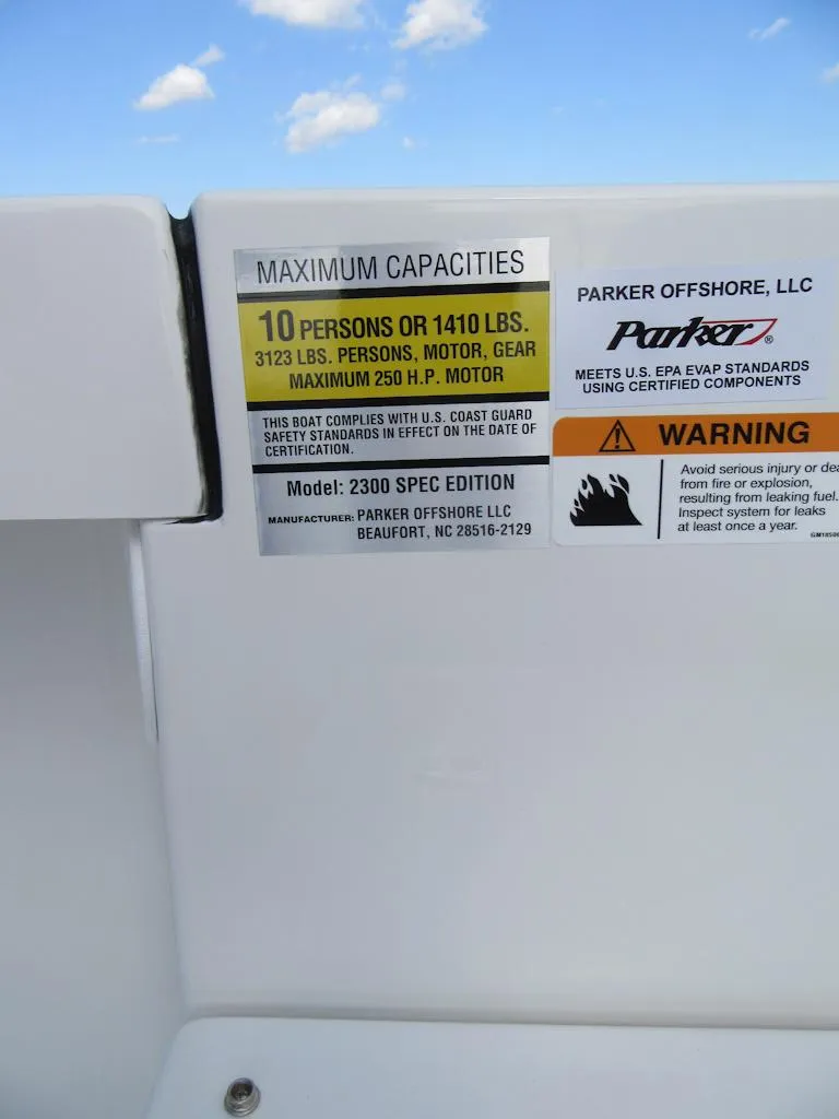 Slide: The Image of Capacity label on 2025 Parker 23 SE CC boat, maximum 10 persons or 1410 lbs. - 21
