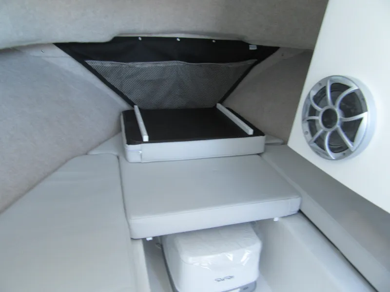 Slide: The Image of Interior cabin of 2025 Parker 2120 Sport Cabin with seating and speaker. - 8