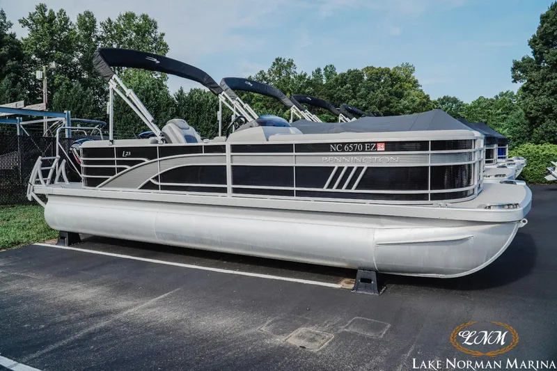 Slide: The Image of 2023 Bennington 23 LSR pontoon boat at Lake Norman Marina. - 1
