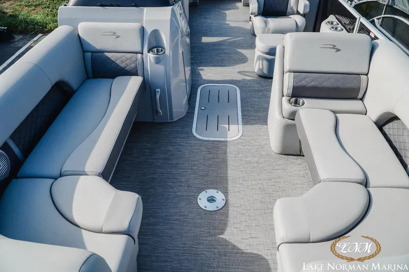 Slide: The Image of 2023 Bennington 23 LSR pontoon boat interior with luxurious seating at Lake Norman Marina. - 13