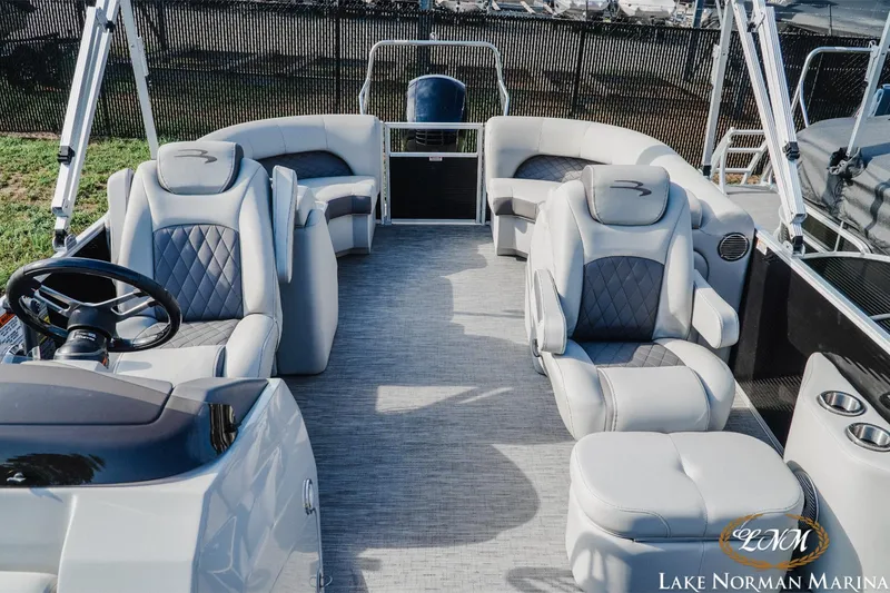 Slide: The Image of 2023 Bennington 23 LSR pontoon boat interior with luxurious seating at Lake Norman Marina. - 15