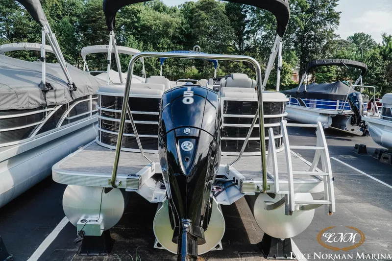 Slide: The Image of 2023 Bennington 23 LSR pontoon boat with outboard motor at Lake Norman Marina. - 5