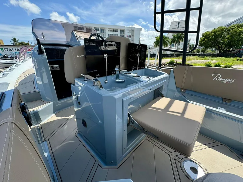 Slide: The Image of Interior of 2025 Ranieri CAYMAN 28 EXECUTIVE boat with modern seating and control console. - 15