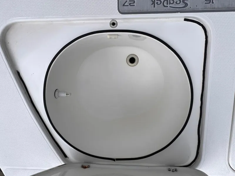 Slide: The Image of 2001 Rinalli 2100 Bay boat livewell compartment. - 11