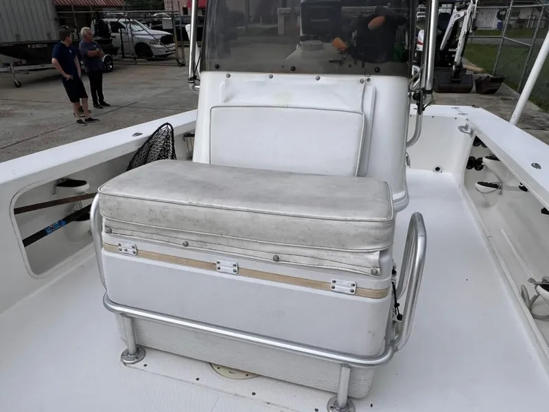 Slide: The Image of 2001 Rinalli 2100 Bay boat with cushioned seating and console. - 12