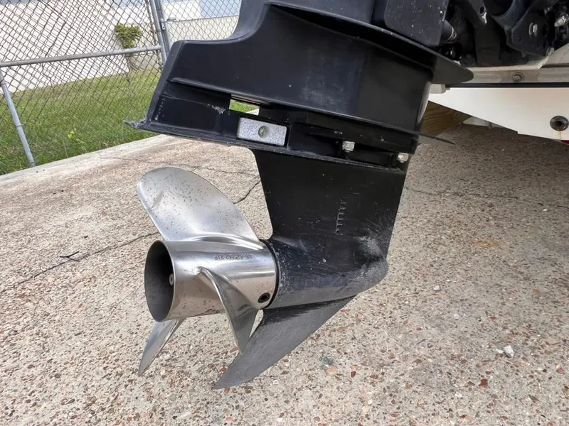 Slide: The Image of Close-up of a 2001 Rinalli 2100 Bay boat propeller and lower unit. - 16