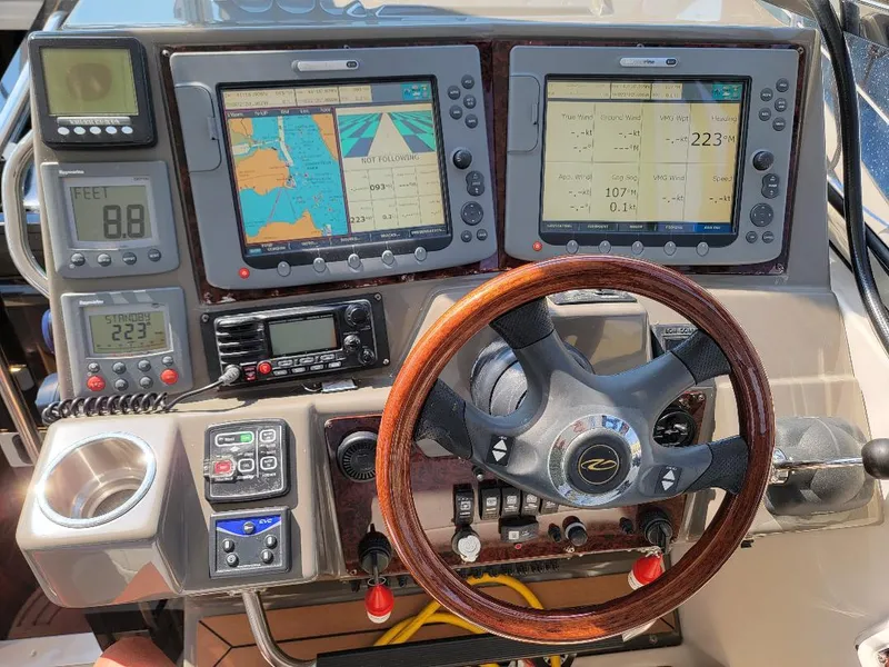 Slide: The Image of Helm of 2007 Regal Commodore 4460 with navigation screens and controls. - 2